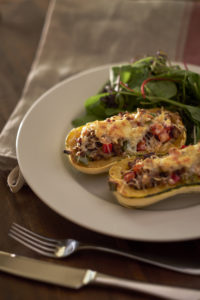 Delicata Squash Stuffed with Sausage Peppers and Onions